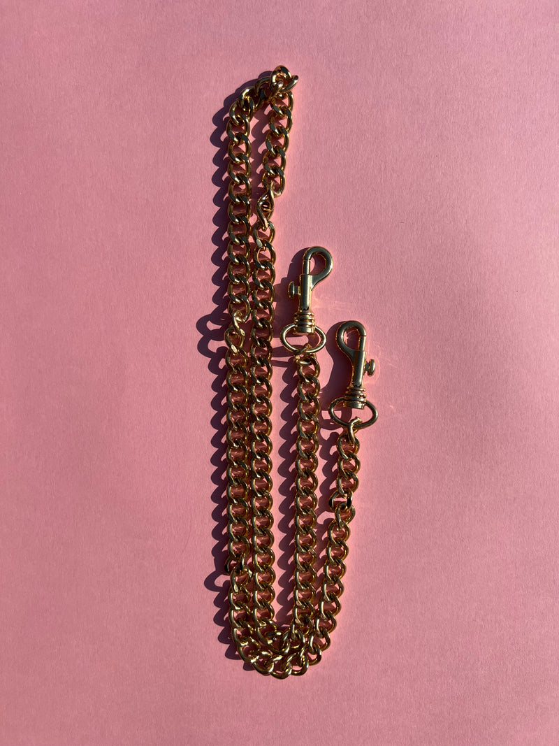 Medium Heavy Gold Chain with entertwined chain loops as a strap