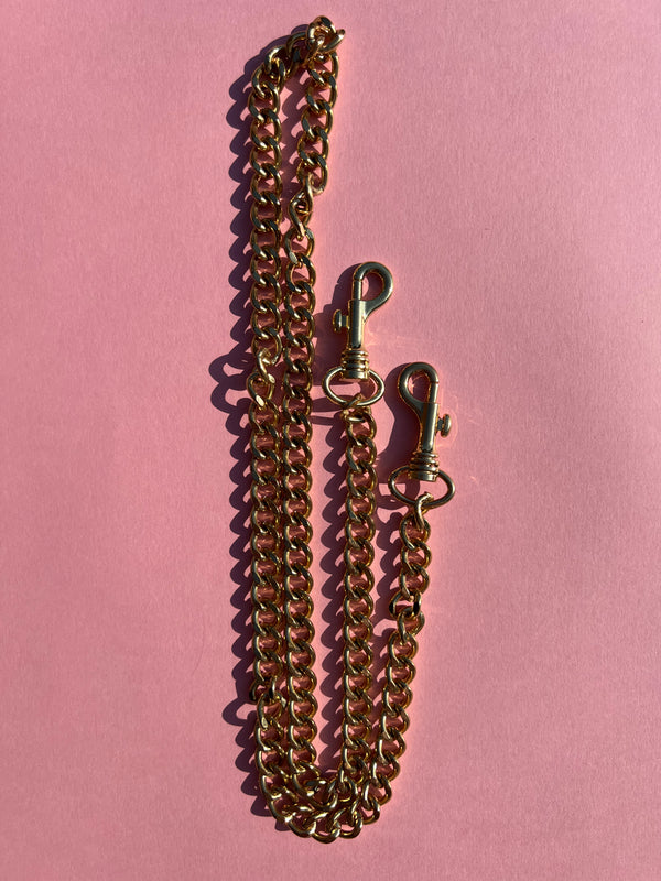 Medium Heavy Gold Chain with entertwined chain loops as a strap