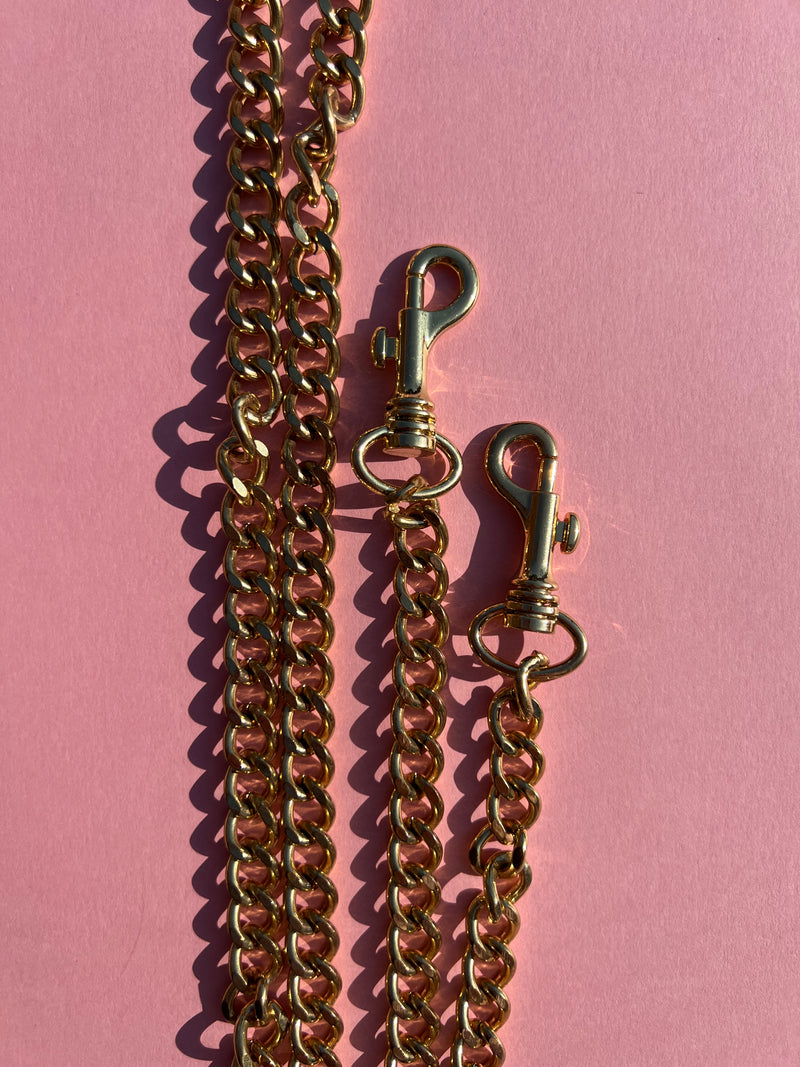 Medium Heavy Gold Chain with entertwined chain loops as a strap